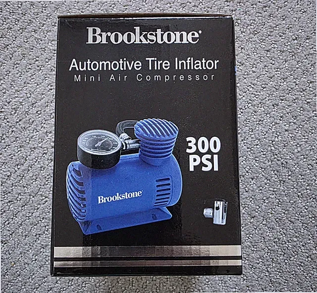 Brookstone Automotive Tire Inflator Mini Air Compressor 300 PSI 12V