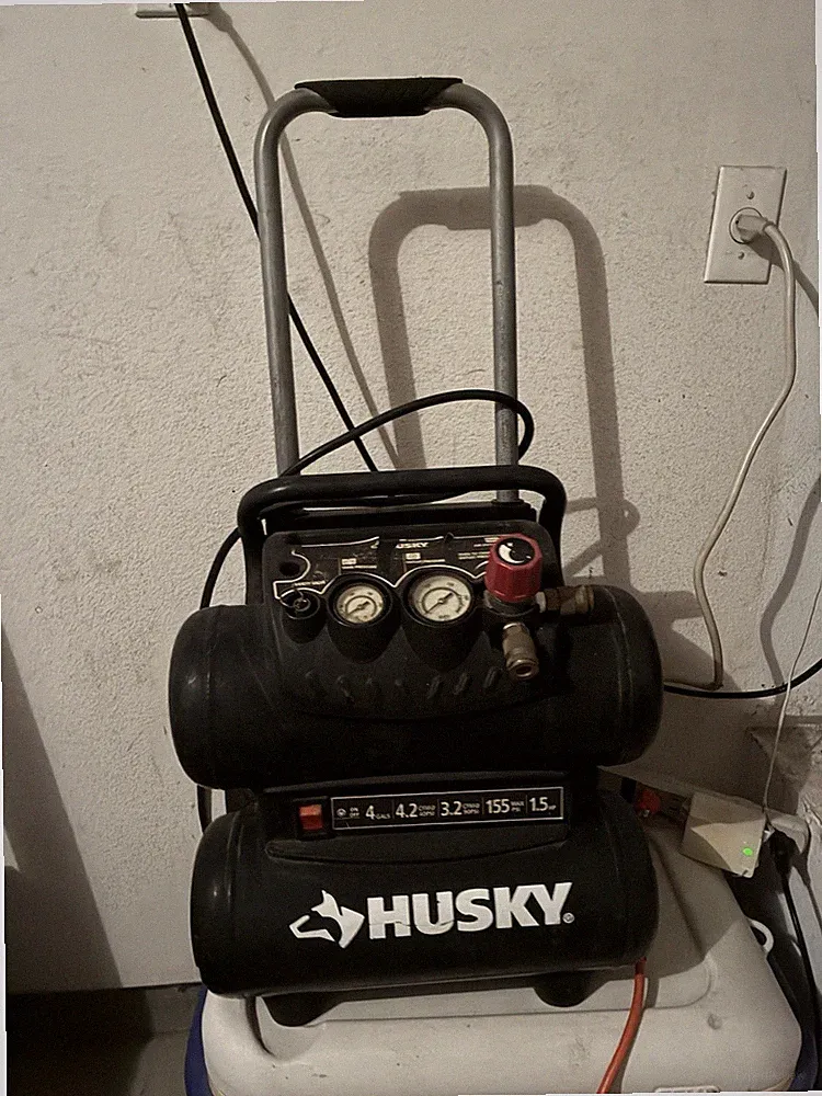 Husky 4 Gallon Oil-Free Portable Stack Tank Air Compressor, model H1504ST2.